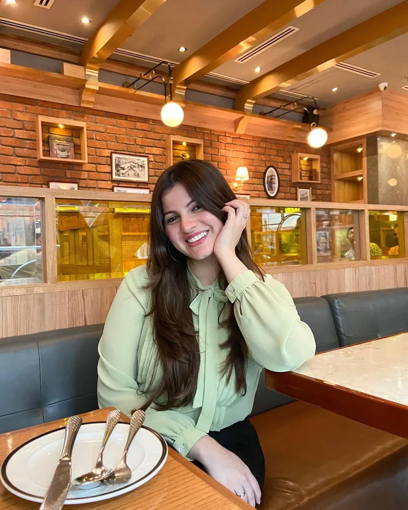 A creator at a restaurant booth
