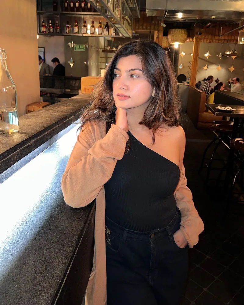 A creator at a restaurant bar